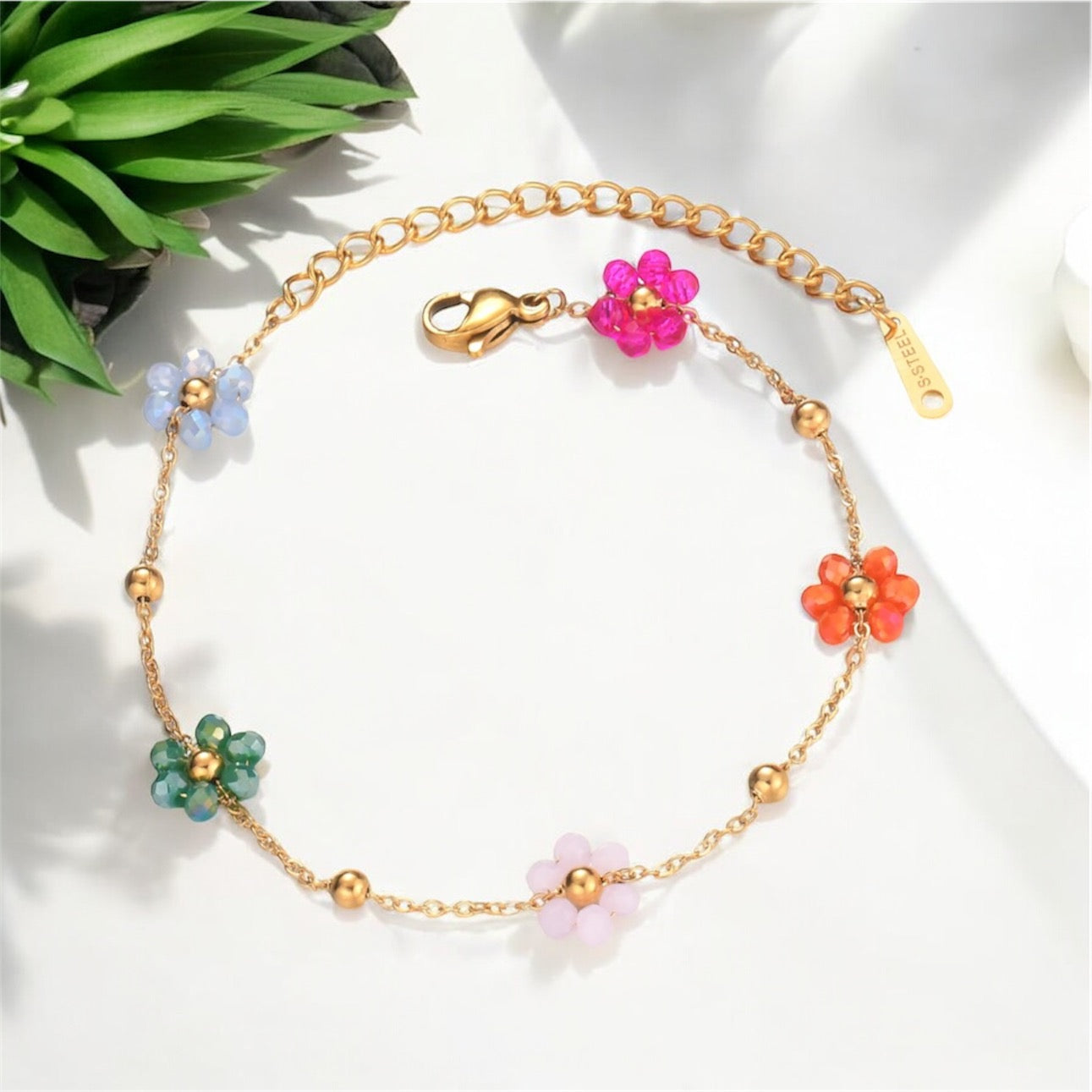 Gold Plated bracelet with 5 flowers